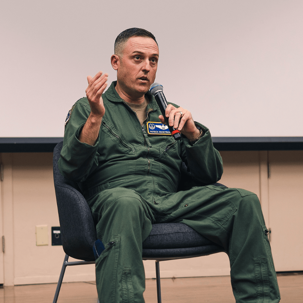 Patrick McGetrick speaking into a microphone.