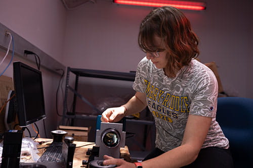 Student Adriana Feener working in the Space Physics Lab